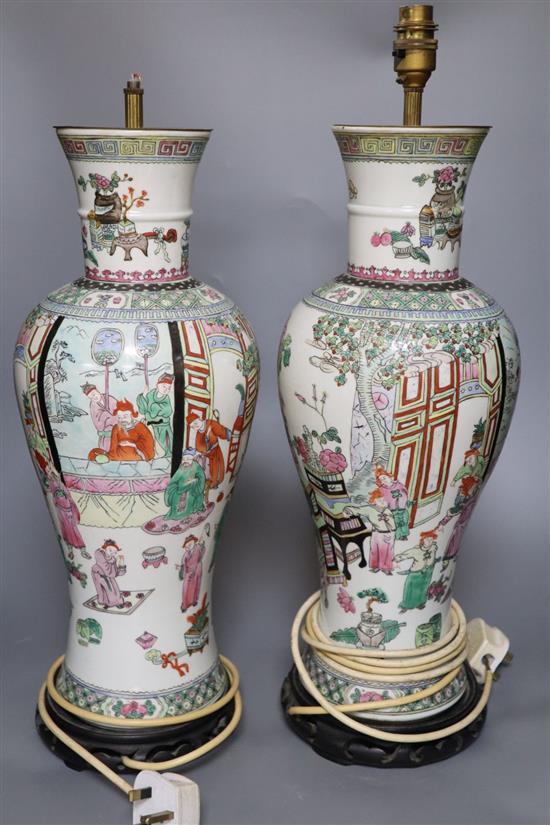 A pair of Chinese-style famille rose table lamps and shades, total height to fitting 57.5cm, one lamp fitting lacking